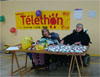 JACQUELINE et BARBARA de la rsidence APF Les MYOSOTIS : Avec leur enthousiasme et leur gnrosit, derrire le stand de vente de Porte-cls Tlthon et de paquets de bonbons, en offrant leur nergie  d'autres par leur participation renouvele  cette cause.